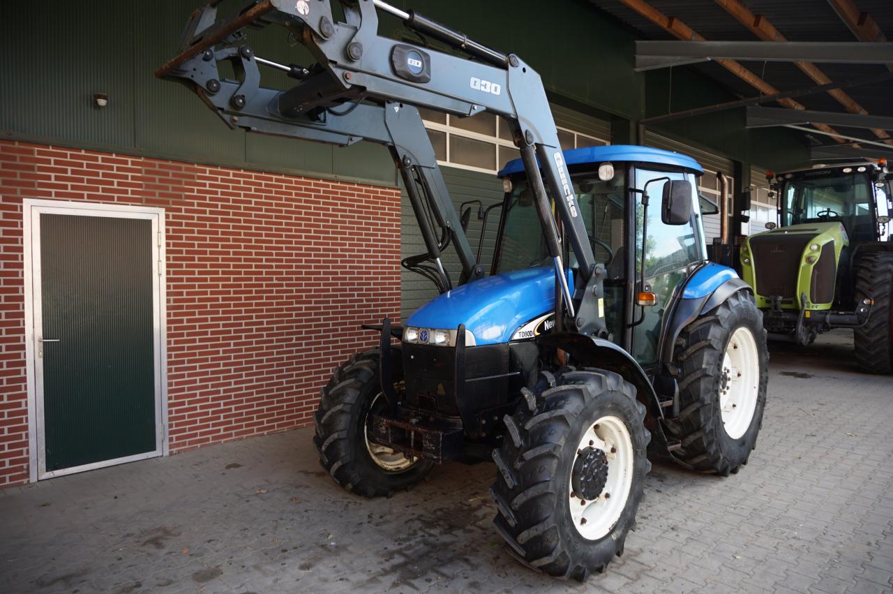 New Holland TD80d mit Quicke Frontlader Rear