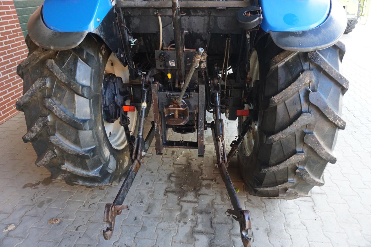 New Holland TD80d mit Quicke Frontlader Above