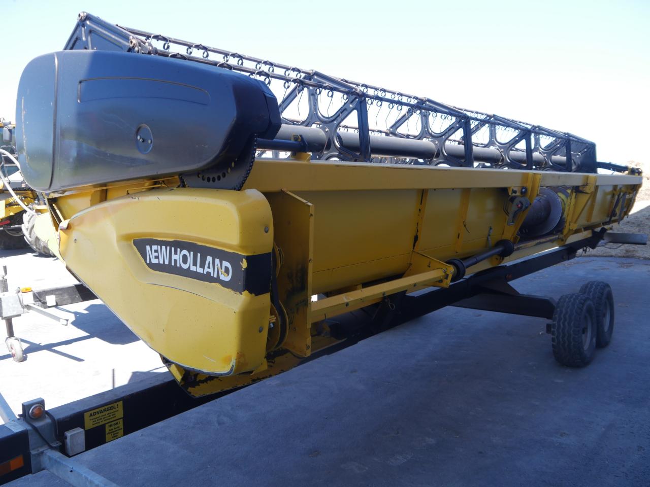 New Holland CX 880 + 9m Schneidwerk Front
