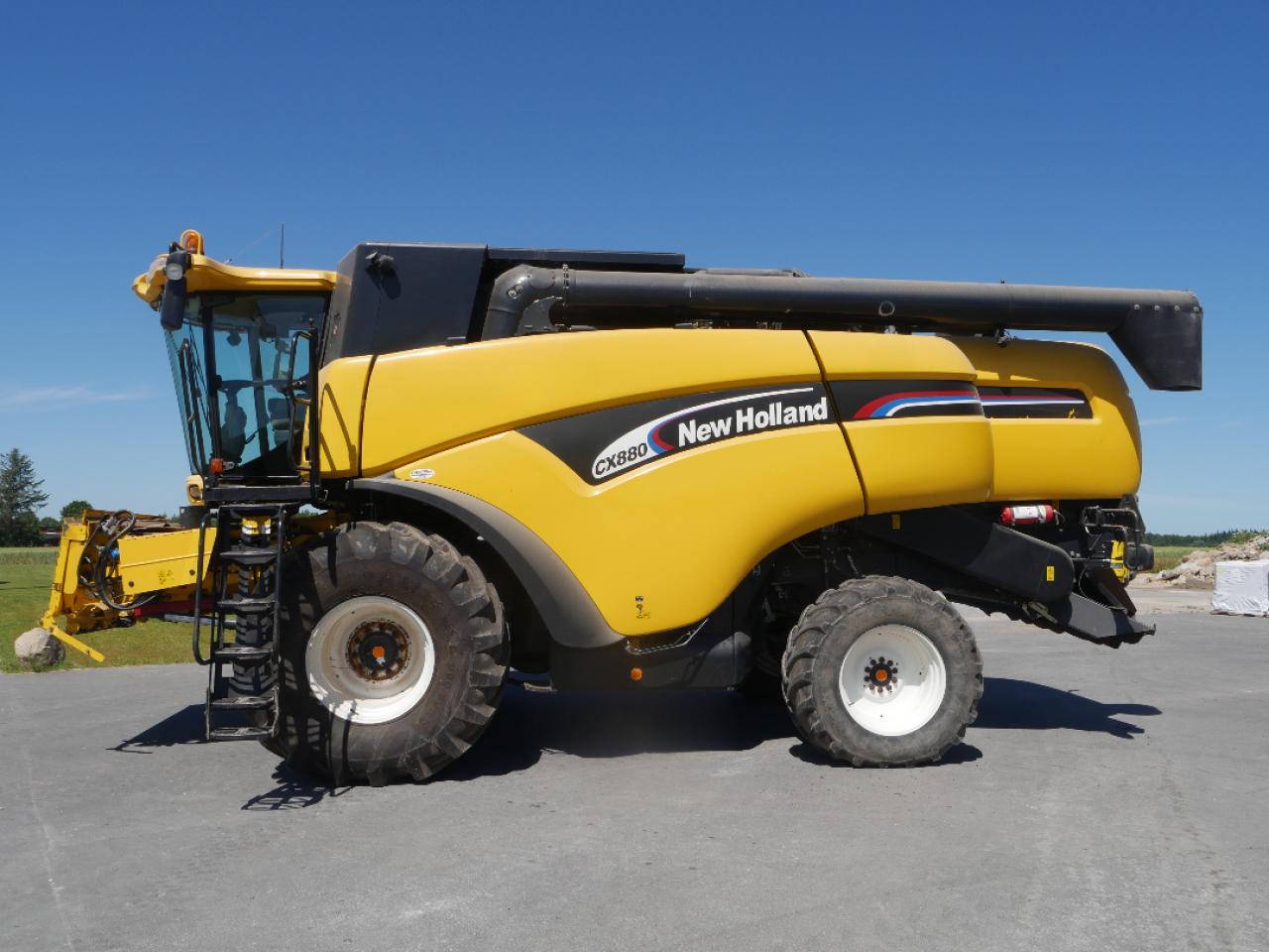 New Holland CX 880 + 9m Schneidwerk Rear